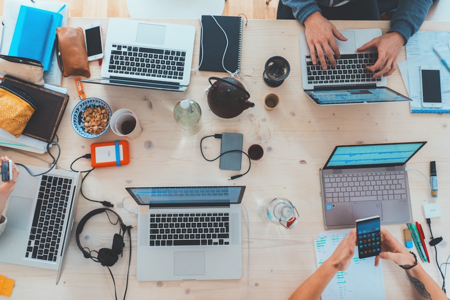 Team working on laptops in an office